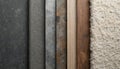 Material samples collection for interior design inspiration featuring stone concrete metal wood, carpet textures. Includes grey Royalty Free Stock Photo