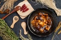 Material of traditional chinese food,spicy Mapo Tofu decorates with chilis and hot peppers on black background Royalty Free Stock Photo