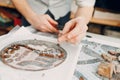 Materials sketch and tools for making colored smalt glass mosaics. Master class making mosaic woman ancient greek