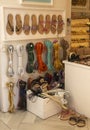Materials, tools and handmade slippers and sandals in Italy