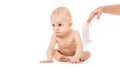 Maternal care for babe - wiping the baby skin with wet wipes. funny baby emotions. Baby Care Hygiene. Cleaning wipe, pure, clean