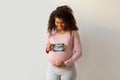 Maternity Concept. Happy Black Pregnant Woman Holding Ultrasound Photo Of Her Baby Royalty Free Stock Photo