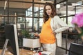 Worried pregnant CEO finishing deals