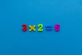 Math action on blue paper background Royalty Free Stock Photo
