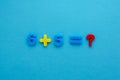 Math action on blue paper background Royalty Free Stock Photo