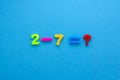 Math action on blue paper background Royalty Free Stock Photo