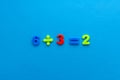 Math action on blue paper background Royalty Free Stock Photo
