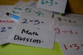 Math Division write on a sticky note isolated on Office Desk. Education concept Royalty Free Stock Photo