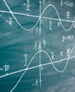 Math lesson. Sine and cosine functions. Graphics graphics drawn on the Board Royalty Free Stock Photo