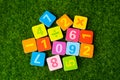 Math number colorful on grass background, Education study mathematics learning teach.