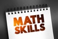 Math Skills text on notepad, concept background