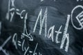 Math Text with some formulas on chalkboard