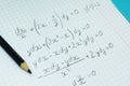 Mathematical examples and calculations in a notebook for lectures. The study of arithmetic Royalty Free Stock Photo