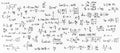 Mathematical formulas calculations numbers equations and calculations written by hand in black marker on a white board, school bac Royalty Free Stock Photo