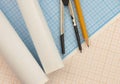 Mathematical instruments over the corner of a math graph paper with copy space for text. Math graphic tools concept Royalty Free Stock Photo