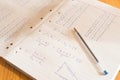 Mathematical sums written on pad paper Royalty Free Stock Photo