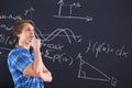 Mathematics , chart, table - thoughtful student Royalty Free Stock Photo