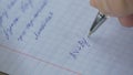 Mathematics, Equations close-up. Homework. Solving Mathematical Problem. Student solves the equation on paper Royalty Free Stock Photo