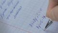 Mathematics, Equations close-up. Homework. Solving Mathematical Problem. Student solves the equation on paper Royalty Free Stock Photo