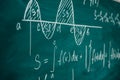 Mathematics lesson differential and integral calculus Chalkboard. Royalty Free Stock Photo