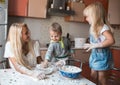 Mather daughter and son throws flour in each other