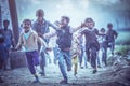 Group of boisterous Indian children running for photograph in Agra, Uttar Pradesh, India