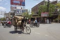 Man on bicycle on street in India