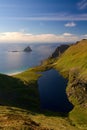 Matinden summit view on Bleiksoya cliff and lake, Vesteralen, Norway