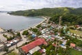 Matnog, Sorsogon, Philippines. Aerial of the coastline and town proper. A tall cell tower in the righ