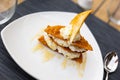 Mato served with honey and biscuits on plate