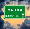 MATOLA road sign against clear blue sky
