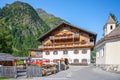 MATREI IN OSTTIROL, AUSTRIA - AUGUST 21, 2021: Matreier Tauernhaus - typical alpine hotel and restaurant in Matrei in