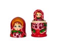 Matreshka Russian doll souvenir bright red, purple and green flowers pattern on white background isolated closeup