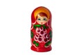 Matreshka Russian doll souvenir bright red, purple and green flowers pattern on white background isolated closeup