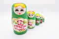 Green russian national Matrioska toy on white background Royalty Free Stock Photo