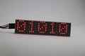 Matrix display board made from red dot LED showing some numbers. Binary numbers are shown on an matrix display