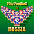 Matryoshka play football, soccer ball on the field