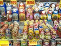 Matryoshkas, traditional Russian souvenirs for tourists. Wooden nesting dolls for sale. Selective focus.