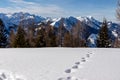 Matschacher Gupf - Foot prints in the snow on mountain summit of in Karawanks, Carinthia, Austria. Royalty Free Stock Photo