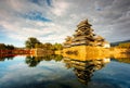 Matsumoto Castle in Matsumoto City Nagano Prefecture In autumn, the change of time from day to night The golden light of the sun Royalty Free Stock Photo