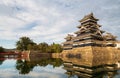 Matsumoto Castle in Matsumoto City Nagano Prefecture In autumn, the change of time from day to night The golden light of the sun Royalty Free Stock Photo