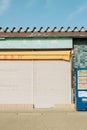 Store, closed shutter door and drink vending machine in Matsushima, Miyagi, Japan