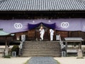 O-henro Buddhist pilgrims at Jodoji, temple number 49 of Shikoku pilgrimage Royalty Free Stock Photo