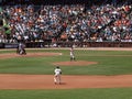 Matt Cain throws pitch as 2nd base Freddy Sanchez Royalty Free Stock Photo