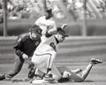 Matt Williams tags out Howard Johnson as he slides into 3rd base