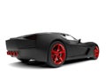 Matte black super sports concept car with red rims and details - back view