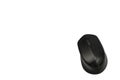 A matte black wireless computer mouse isolated on a white background. Royalty Free Stock Photo