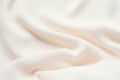 Matte cream delicate soft pleated fabric background. Smooth elegant luxury cloth texture. Gentle color wedding background