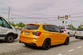 A matte gold BMW SUV with custom tags Royalty Free Stock Photo