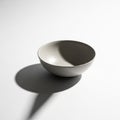 Accentuates the bowl s curvature and smooth texture creating a Royalty Free Stock Photo